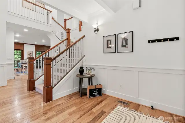 Featuring beautiful hardwood floors and classic spindle railing—blending warmth, charm, and function in this versatile space.