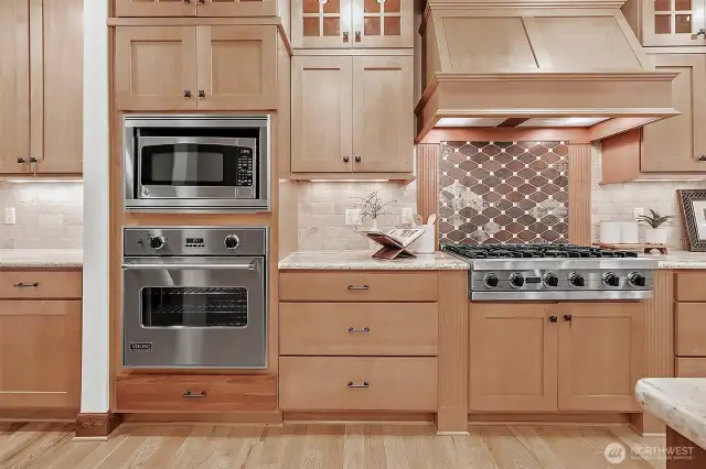 Solid wood cabinetry offers generous storage throughout—keeping everything organized and within reach.