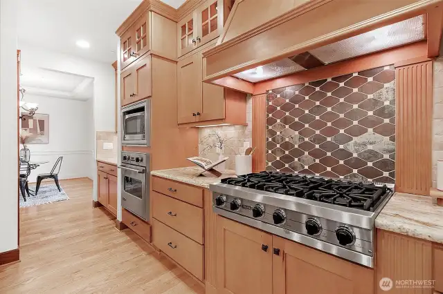 Viking gas cooktop framed by stunning tile backsplash—where style meets culinary performance.