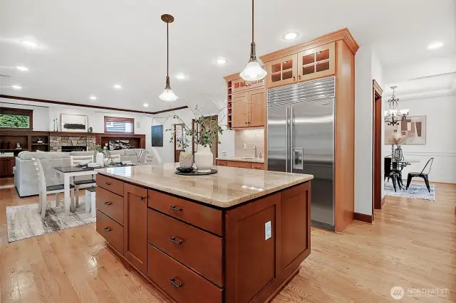 Open-concept design with seamless flow between kitchen, dining, and living spaces—perfect for hosting gatherings of any size.