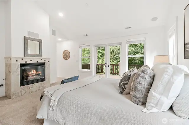 Retreat to your private sanctuary with fireplace, spa-inspired 5-piece bath, and deck access.