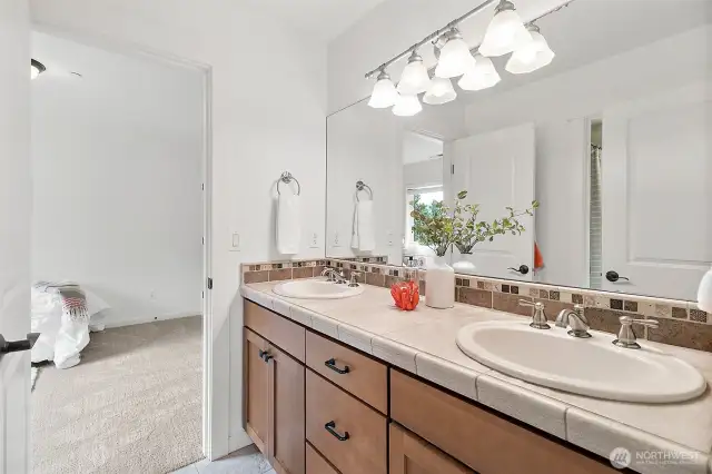 Sleek and stylish design featuring dual sinks for convenience and contemporary flair.