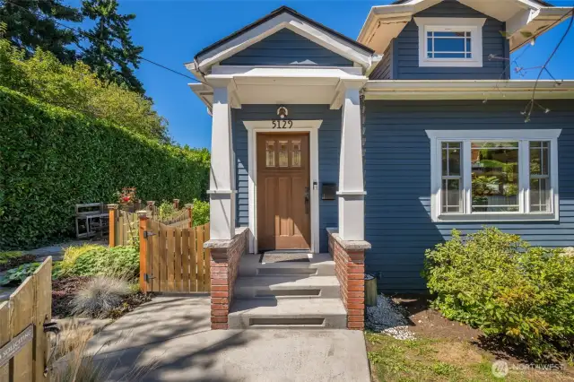 Fully fenced with multiple slate patios, fully-fenced yard and mature gardens.