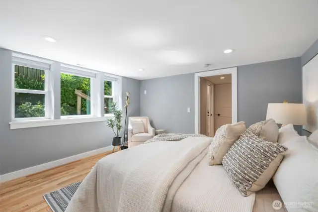 The lower level primary is spacious with great light out to the private side yard.