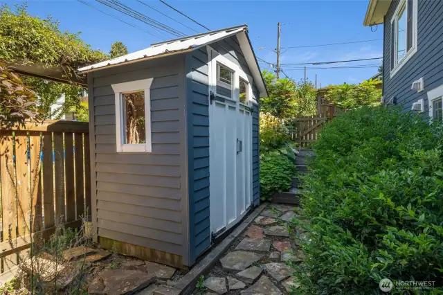 Side yard with yard storage.