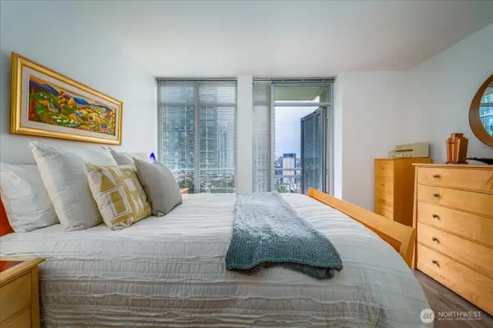 Primary bedroom with deck and beautiful views