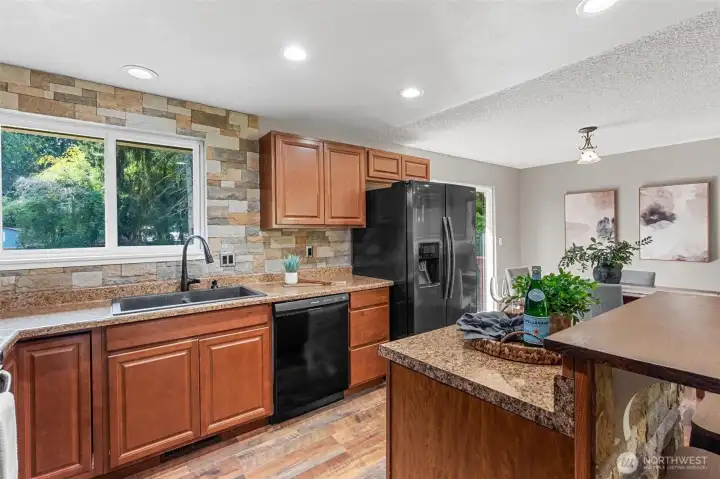 Warm kitchen boasts a movable island!