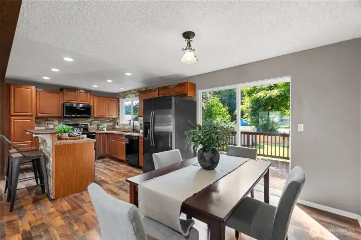 Located right off the kitchen is your dining area that looks out to your backyard!