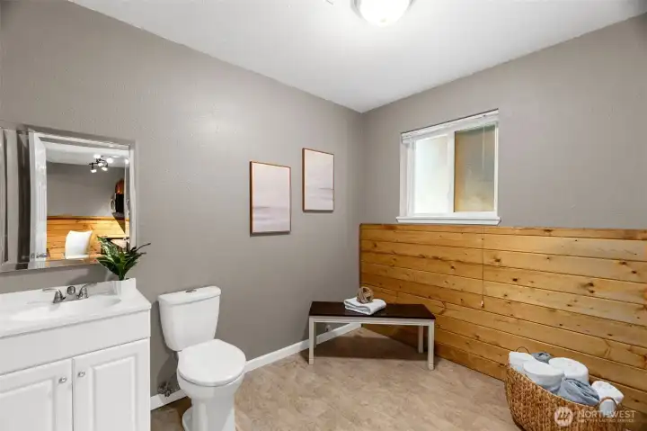 Bring your ideas for this large powder room off the downstairs bedroom.