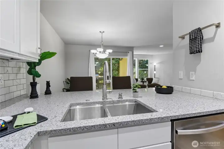 Eating counter to interact while cooking.