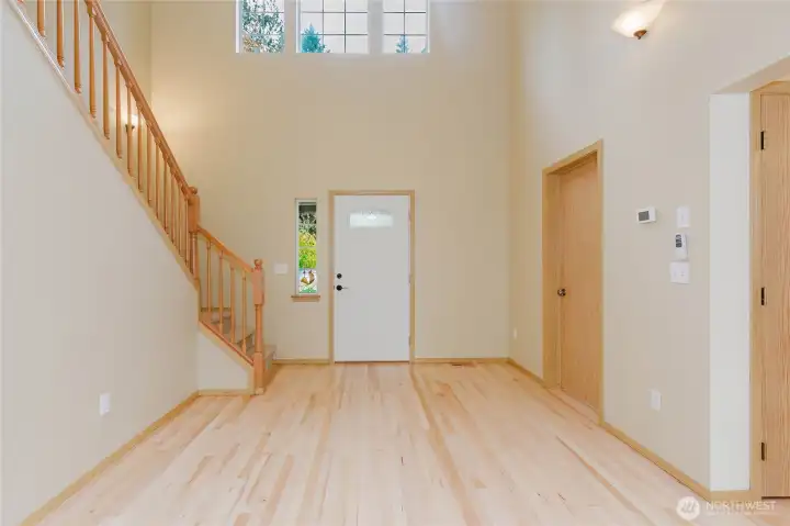 Soaring entryway with natural light.