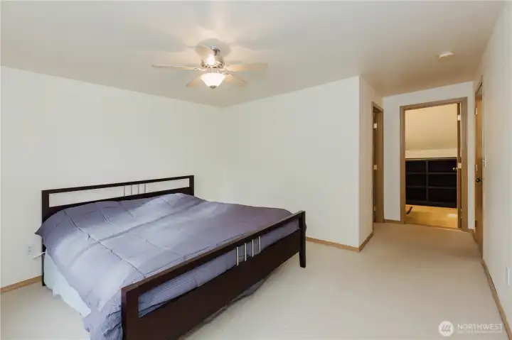 The primary bedroom boasts a private bath and a walk-in closet.