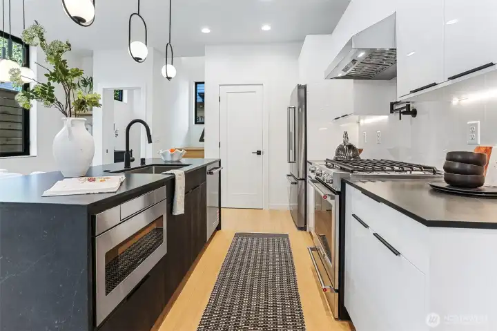 Kitchen Aid Appliance Package with Gas Cooktop, Pot Filler and Full Surround Backsplash