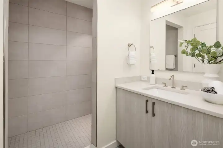 3/4 ensuite bath connected to lower level guest suite.