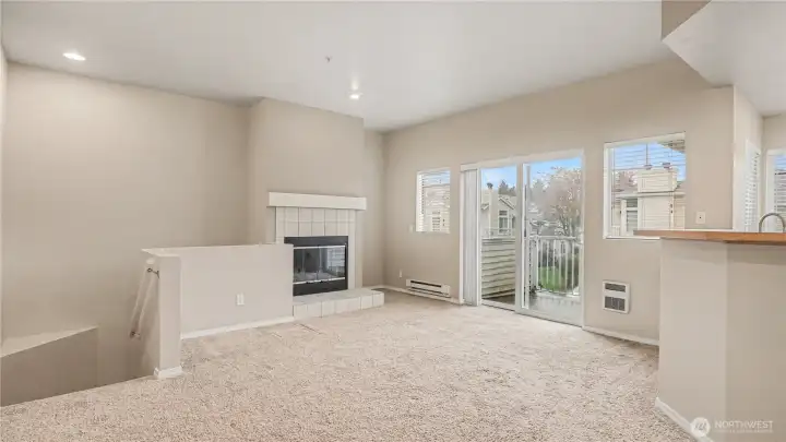 A spacious and inviting living room, complete with fireplace for cozy evenings.