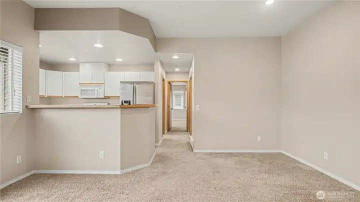 An open, versatile space with endless possibilities—perfect for creating a cozy dining area or a personalized gathering spot.