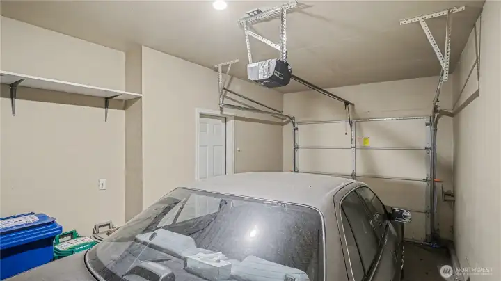 Also includes attached 1-car garage & parking spot in driveway.