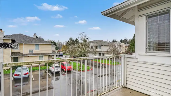 Step onto the private deck, offering a seamless indoor-outdoor living experience.