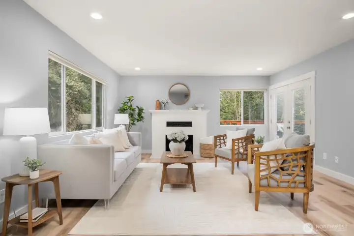 Living room on main floor with french doors out to the deck