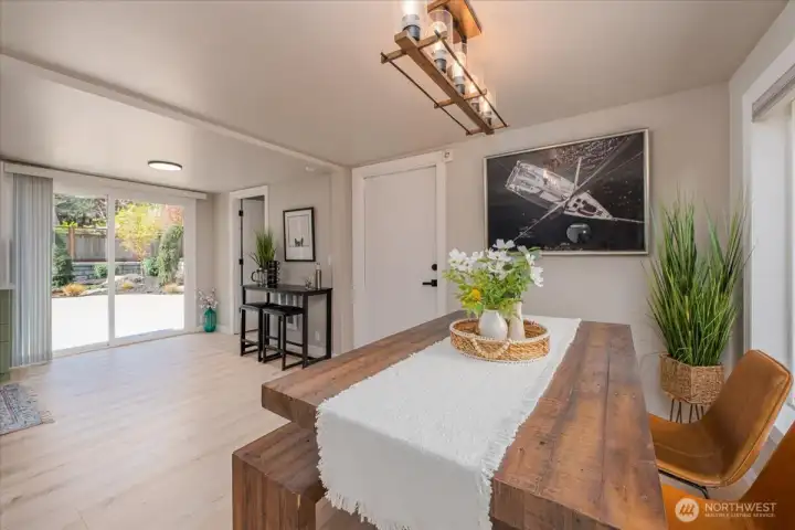 Dining space leads into kitchen, garage, laundry room or backyard