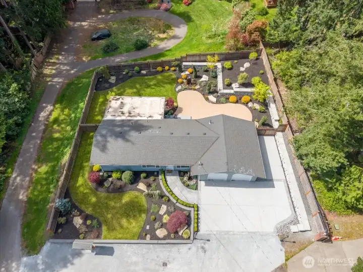 This park like home can be your oasis!  RV parking on the side with newly pour concert driveway and retaining wall.