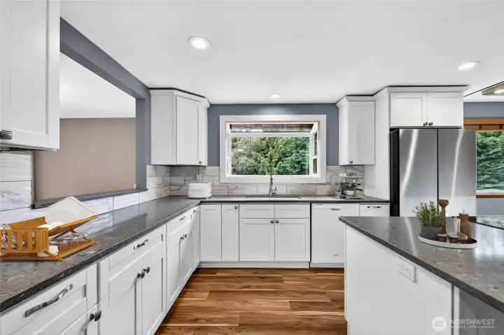 OTS of workspace on quartz countertops / Tile wall backsplash accents