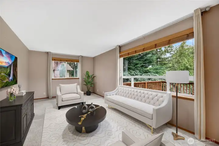 Sunken FAMILY ROOM  Exposed ceiling beam  Picture window wall with wood blinds and curtains