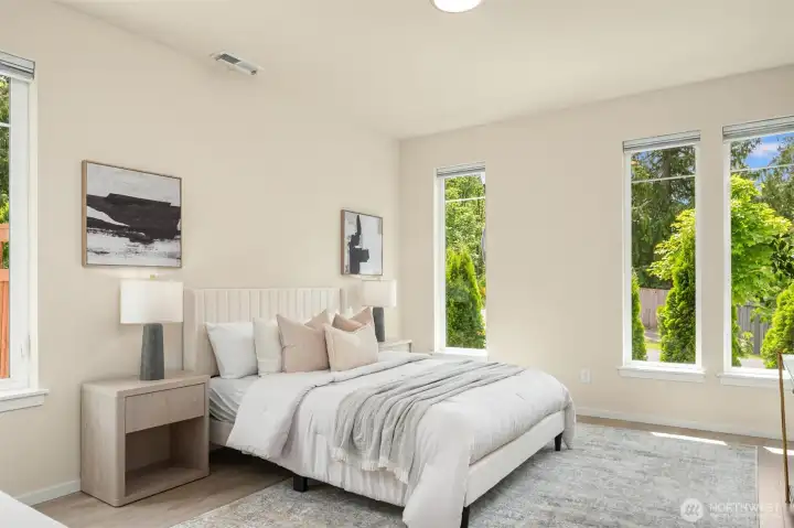 A coveted MainVue upgrade, the main-level guest suite offers exceptional flexibility for multigenerational living, long-term guests, or a private work-from-home retreat, complete with its own ensuite bath and walk-in closet for comfort and privacy.