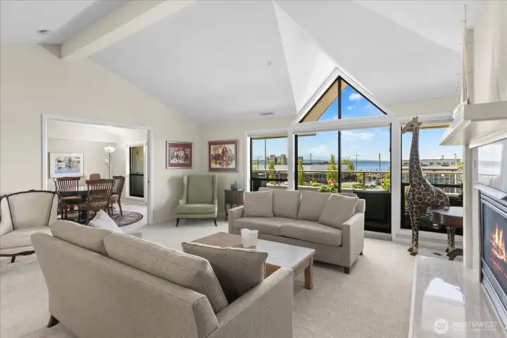 Seamlessly flowing from the living room, dining areas and spacious front deck that spans from one end of the home to the other.