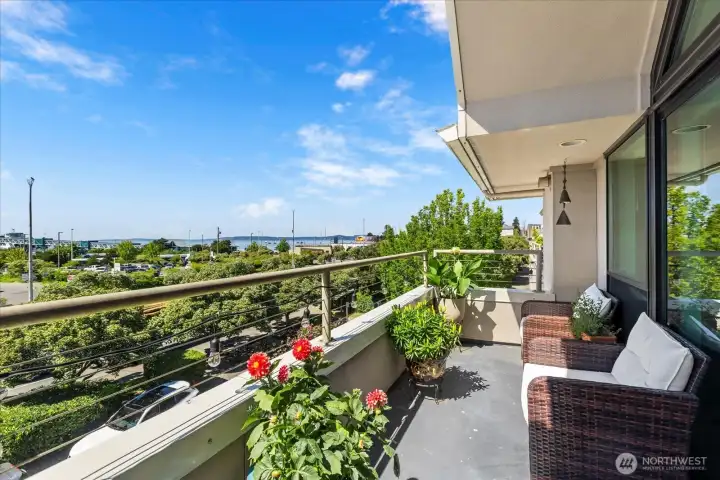 Enjoy stunning views from a generously sized deck with plenty of room for seating, dining, and a BBQ setup.