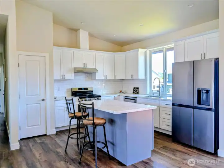 kitchen with breakfast bar and pentry