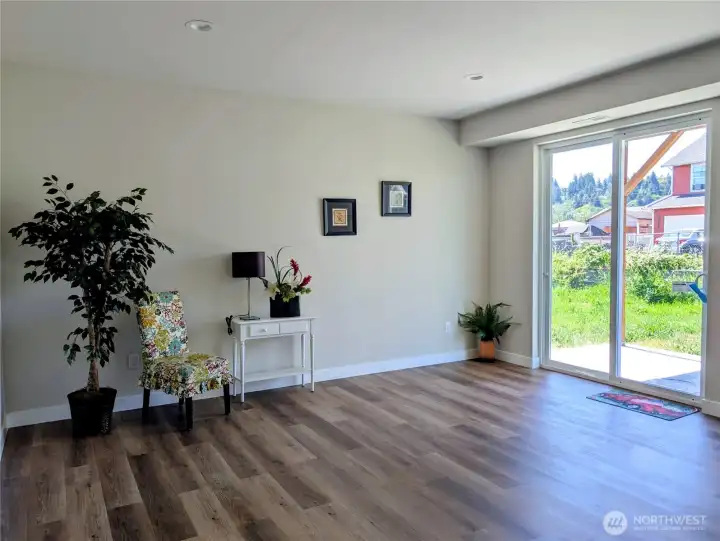 Large Family room with access to patio and back yard.