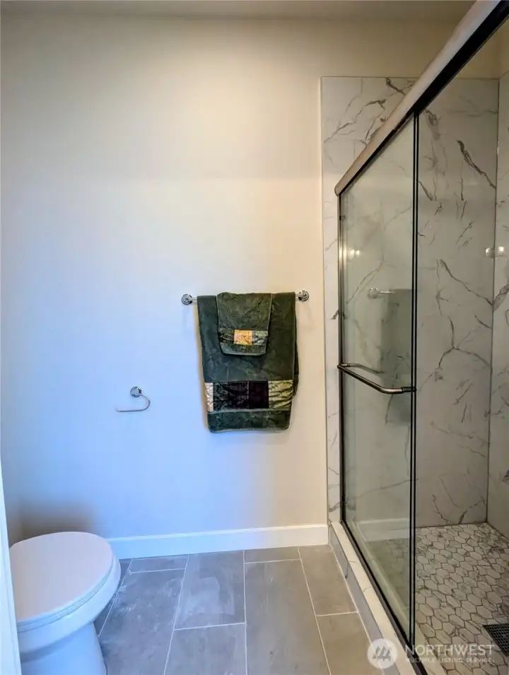 separated shower in master bath.