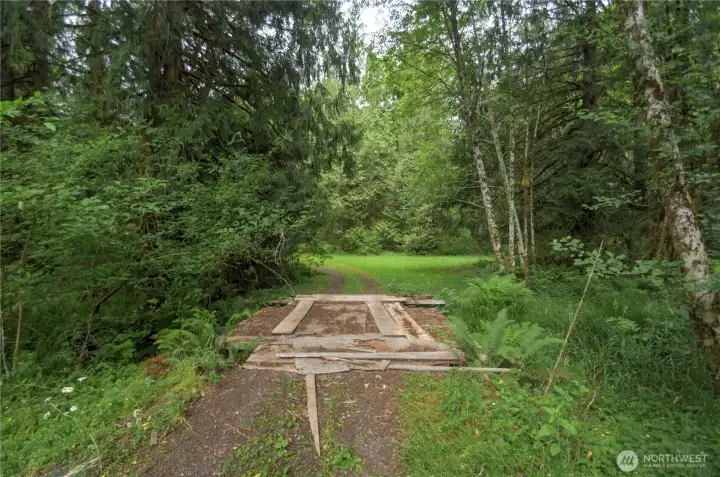 Who doesn't want their own bridge, over their own creek fed from the pond on their property??