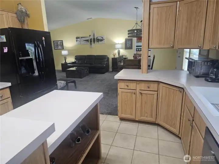 This stunning kitchen features an open-concept layout that flows seamlessly into the great room, creating a perfect space for entertaining. This stunning kitchen features an open-concept layout that flows seamlessly into the great room, creating a perfect space for entertaining.