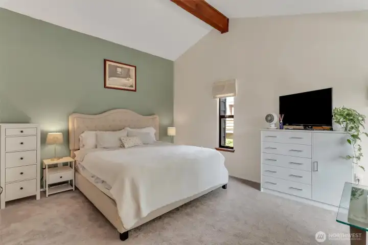 Primary bedroom is extra large with vaulted ceilings. Primary bedroom is extra large with vaulted ceilings.