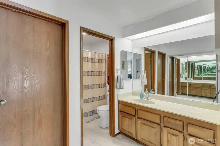 Primary full bath with walk in closet and large amount of counter space. Primary full bath with walk in closet and large amount of counter space.