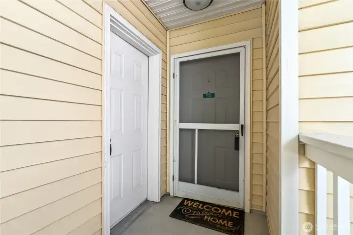 Front door and garage on the left