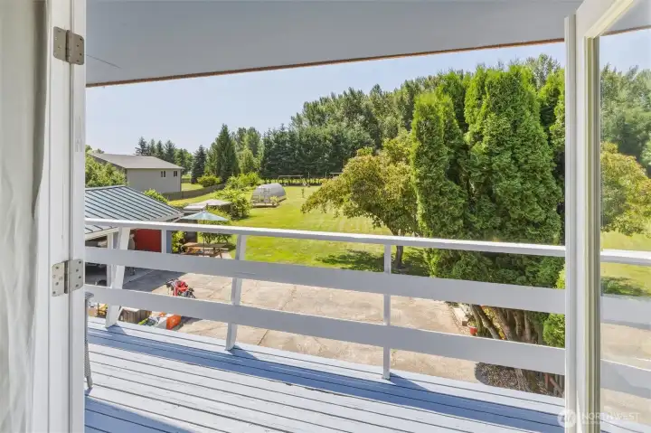 Small deck off of family room that extend the length of the room. Small deck off of family room that extend the length of the room.