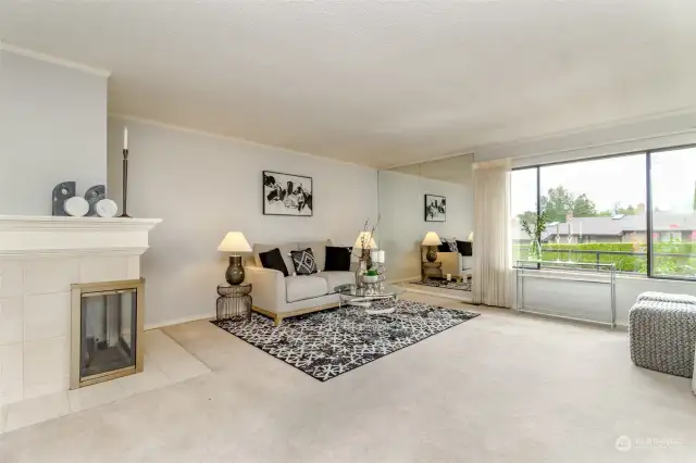 Natural light graces the living room with these east facing windows that celebrate the sunrise.