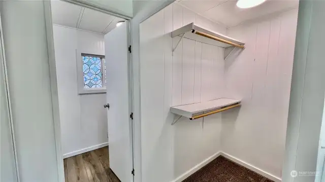 Walk-in closet in primary suite