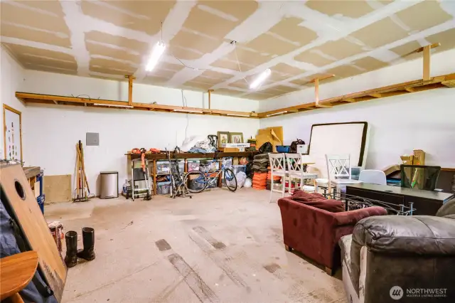 Spacious finished outbuilding--use as extra garage space, workshop, or hobby center.