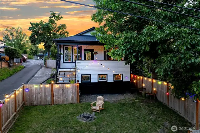 Sitting high on a fully-fenced lot, this east facing 1920’s home with rocking-chair front porch is the perfect place to have your morning coffee or host evening bonfires.