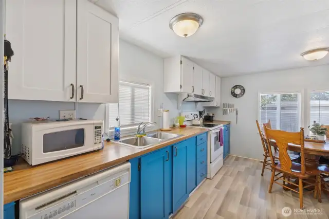 Kitchen features updated cabinet doors, lots of counter space. Newer appliances and double sink
