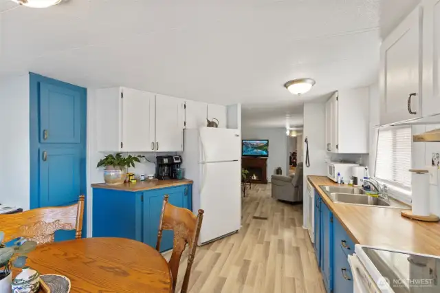 Pantry, coffee bar and dining area round out this spacious kitchen area