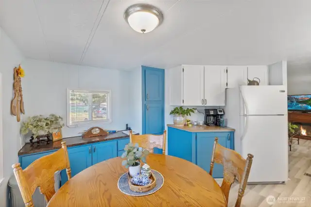 Additional cabinet and countertop space with updated lighting
