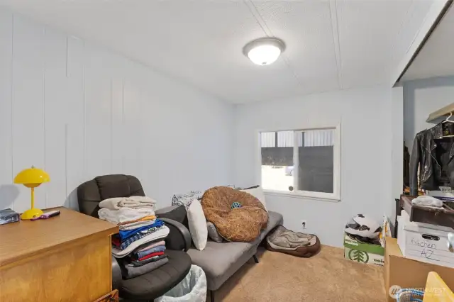 2nd bedroom is clean and bright with open closet space