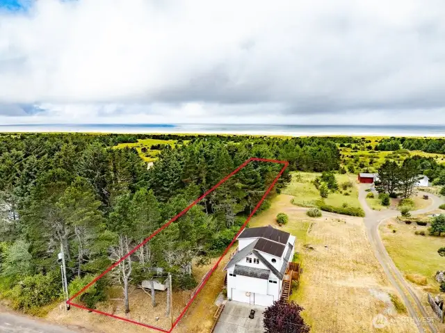 Westside 2 bedroom cabin with property to the Western Upland Boundary. Just a short walk to the beach