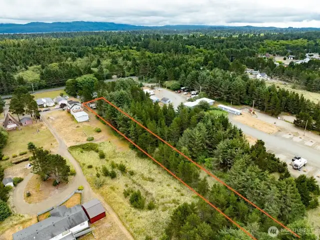 Westside 2 bedroom cabin with property to the Western Upland Boundary. Just a short walk to the beach