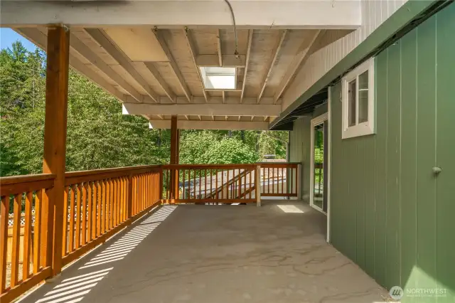 Huge covered back deck and views to the backyard